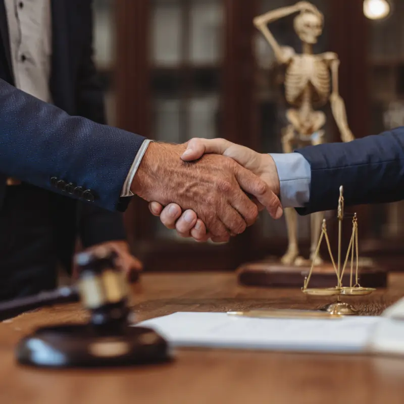 Personal Injury Lawyer helping a client maximize compensation claim