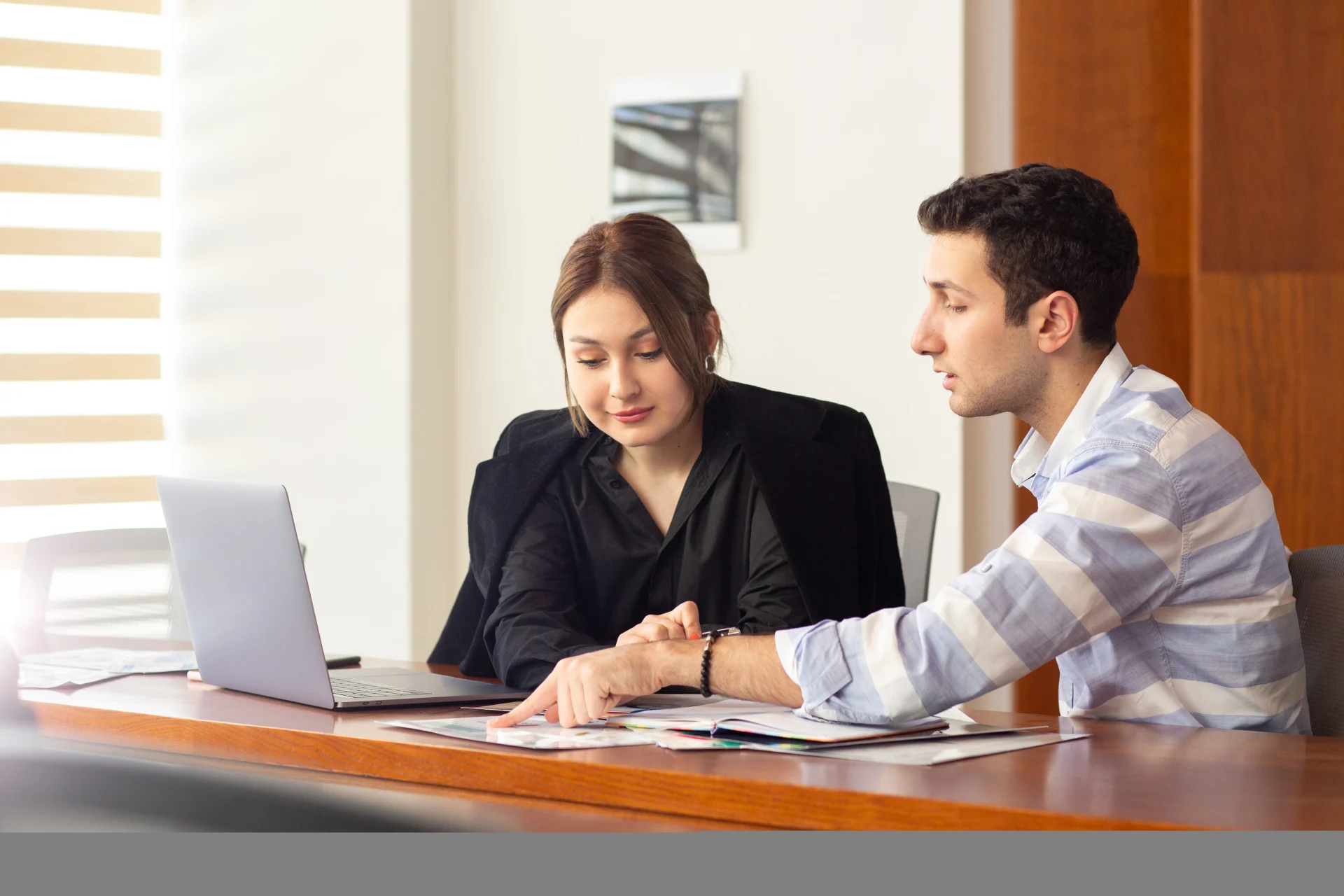 Train accident attorney consulting a client in Liberty