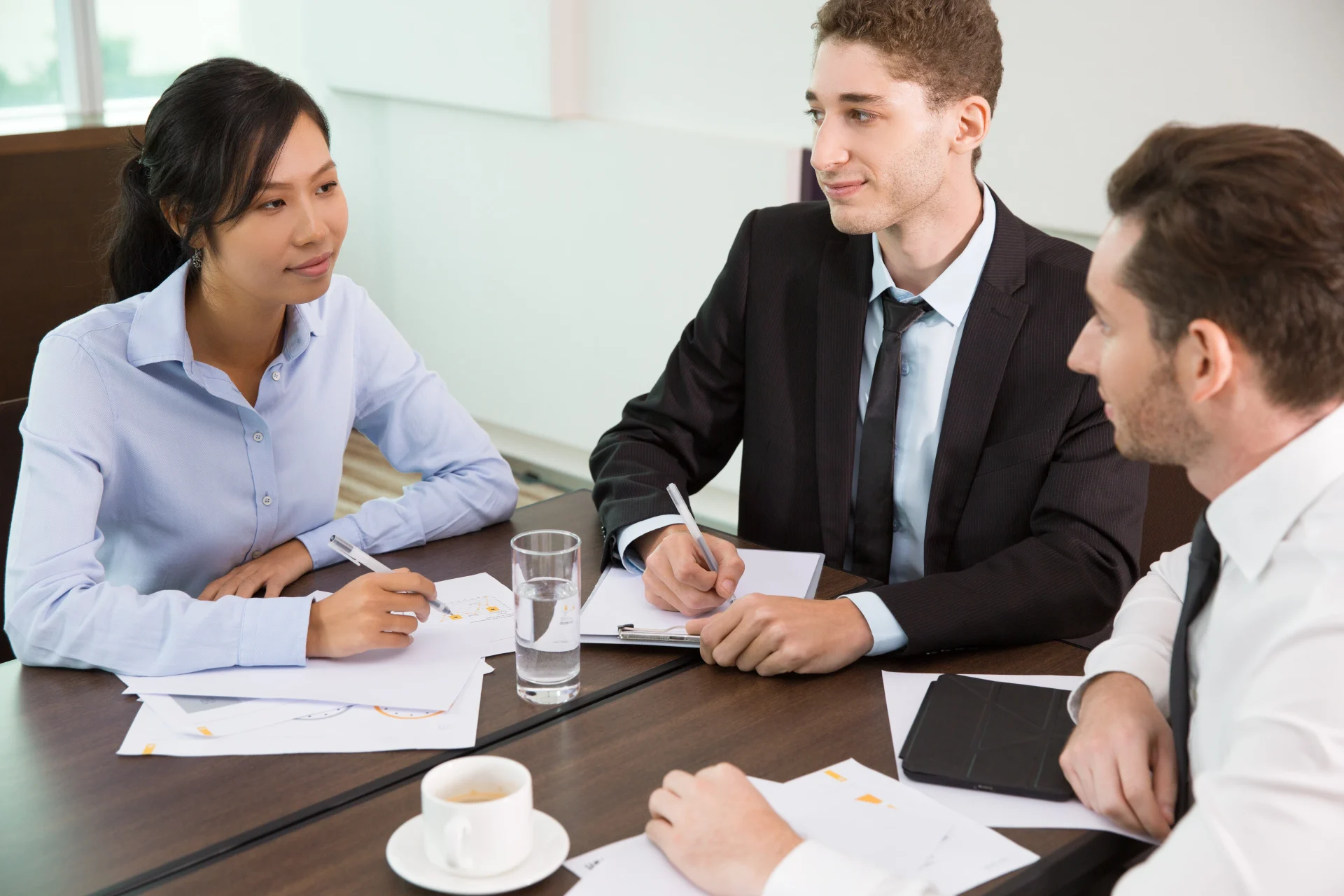 Client meeting with a local car accident lawyer at Empower Injury Law to discuss their injury case and insurance claim